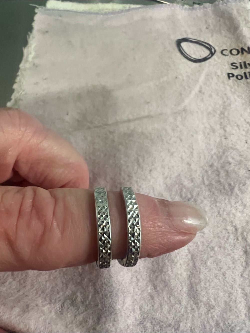 Sterling Silver Reversible Huggy Hoop Earrings. Diamond Cut and Smooth